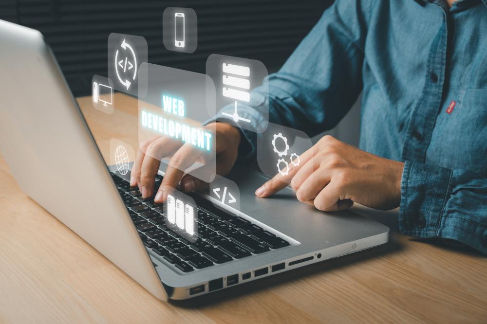 Innovative web development concept Web development innovation with a person using a laptop